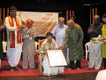 Flutist N. Rajkamal receiving the Ananya Yuva Puraskara